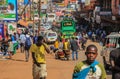 The street life of Uganda`s capital. Crowd of people on the streets and heavy traffic