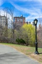 Street Light along a Path next to The Pool at the Northern Area of Central Park in New York City during Spring Royalty Free Stock Photo