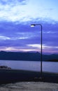 Street light in evening by the sea Royalty Free Stock Photo