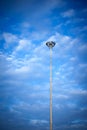 Street light with halogen lamp against blue sky Royalty Free Stock Photo