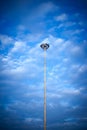 Street light with halogen lamp against blue sky Royalty Free Stock Photo