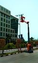 Street light maintenance workers in the dlf cyber city.