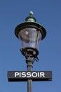 Street light with pissoir sign in Copenhagen