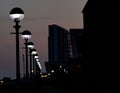 Street light pole with multiple lights illuminating the area