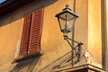Street Light and Shuttered Window of Old House in Warm Evening Light, Pappenheim, Bavaria, Germany Royalty Free Stock Photo