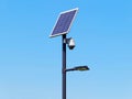 Street lighting pole with photovoltaic panel and surveillance camera Royalty Free Stock Photo