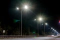 Street lighting, supports for ceilings with led lamps. concept of modernization and maintenance of lamps, place for text, night. Royalty Free Stock Photo