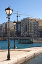 Street lights and maltese boats luzzu in St.Julians
