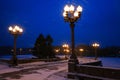 Street lights and road in winter at night. Royalty Free Stock Photo