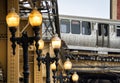 Street Lights and Train on elevated tracks within buildings at the Loop, Chicago City