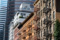 Old and Modern Colorful Buildings and Skyscrapers in the Midtown Manhattan area of New York City with Fire Escapes Royalty Free Stock Photo