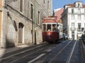 Street in Lisbon with tram car passing