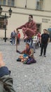 Street magician showing his tricks