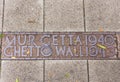 Street marker of the Jewish Warsaw Ghetto Wall, Poland.