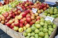 Street market of fresh  red and green garden apples fruits  in wooden boxes Royalty Free Stock Photo