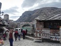 Street market in Old town of Mostar, Old Bridge in background