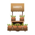 A street market. Wood cart for sale carrots. Selling vegetables