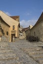 Street in the medieval fortress Rasnov, Transylvania, Romania Royalty Free Stock Photo