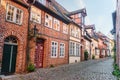 Street with Medieval old brick buildings. Luneburg. Germany