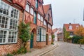 Street with Medieval old brick buildings. Luneburg. Germany