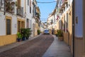 Street of the medieval San Basilio district in Cordoba, Spain Royalty Free Stock Photo