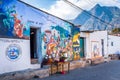 Street mural with Indian Nose national park behind, San Juan la Laguna, Lake Atitlan, Guatemala