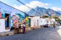 Street mural with Indian Nose national park behind, San Juan la Laguna, Lake Atitlan, Guatemala