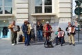 Street musical orchestra of middle aged men