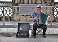 Street musician - harmonist Royalty Free Stock Photo