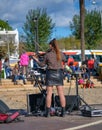 A street musician performs in front of the audience in Roses