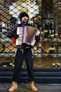 Street musician playing accordion