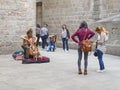 Street musician playing a cello in Barcelona