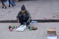 Street musician playing on empty plastic bottles and barrels Royalty Free Stock Photo