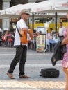 Street musician playing guitar on Plaza Mayor, Madrid Royalty Free Stock Photo