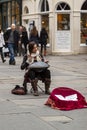 A street musician playing hang drum