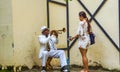 Street musician playing trumpet on the street of Havana, Cuba