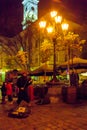 Street musician playing violin at night on the Rynok square in Lviv, Ukraine Royalty Free Stock Photo