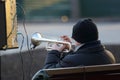 Street musician plays the trumpet Royalty Free Stock Photo