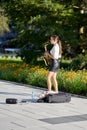 Street musician with Saxophone on the beach promenade of Swinoujscie