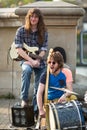 Street musicians in the center of city. Royalty Free Stock Photo