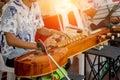 Street musicians play authentic Asian musical instruments