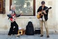 Street musicians play guitar in Lviv Ukraine