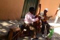 Street musicians playing traditional cuban music on the street in old Havana, Cuba