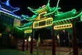 Street at night of Chinatown Central Plaza neon lights of building in Los Angeles, California