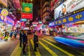 Street at night with illuminated advertisings in Hong Kong