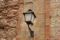 street night light. street lamp on the leg a lantern in retro style black with forged patterns against the sky. Vintage street