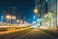 Street at night with passing cars Dubai - UAE