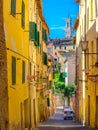 Street of the old city of Siena overlooking the tower of Torre del Manja Royalty Free Stock Photo