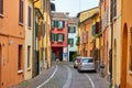 Street with old dwelling houses in Cesena