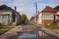 street with old fashioned 1950s style working class bungalows